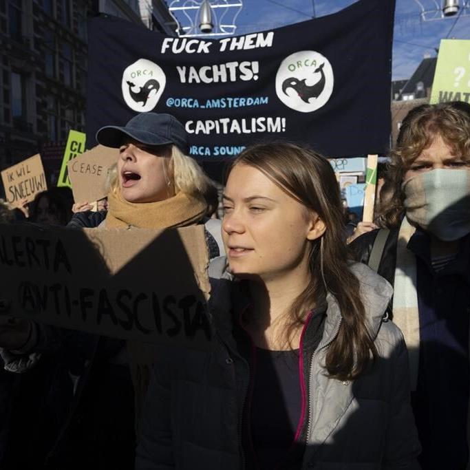 Greta Thunberg brushes off interruption at massive Dutch climate march days before election